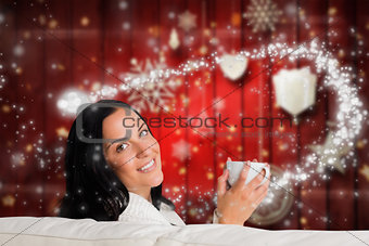 Composite image of woman enjoying a lovely drink