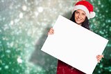 Composite image of woman holding a white sign