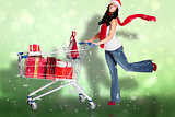Composite image of woman standing with shopping trolley