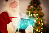 Composite image of santa checking his list