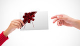 Composite image of hands holding card