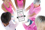 Composite image of group wearing pink and ribbons for breast cancer with hands together