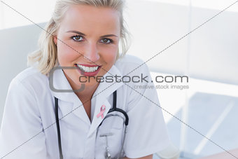 Composite image of portrait of a pretty nurse