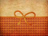 Rope bow on decorative background