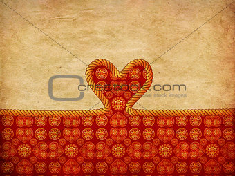 Rope heart on decorative paper