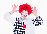 Little Girl in Red Wig Posing as a Clown.