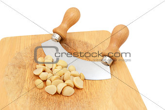 Macadamia nuts with a rocking knife 