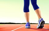 Women Feet on Running Tracks