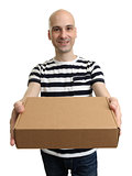 Smiling delivery man holding the box