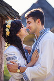Romantic young couple in Ukrainian style clothes