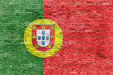 Portuguese flag over brick wall