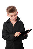 Boy using his tablet.