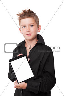 Charming boy showing tablet.