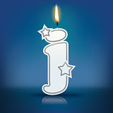 Candle letter j with flame