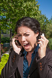 anger woman shouting two phones