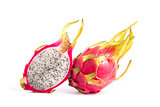 Whole dragon fruit and a cross section  