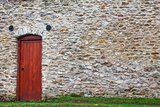 Old Stone wall with door
