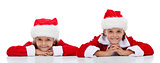Happy kids in Santa Claus outfit - isolated