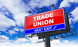 Trade Union Inscription on Red Billboard.
