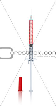 syringe with needle and cap on an isolated white background