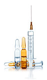 syringe and ampoules on an isolated white background