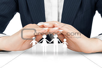 Hands hugging the family (concept)