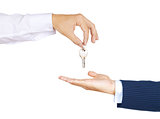 Human hand holding house key