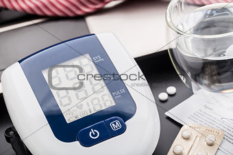 Checking blood pressure in office