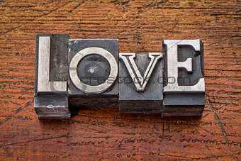 love word in metal type