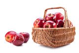 basket with red apples on a white background