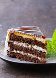 piece of delicious dessert festive cake with chocolate and fruits