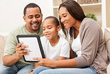 African American Family Using Tablet Computer