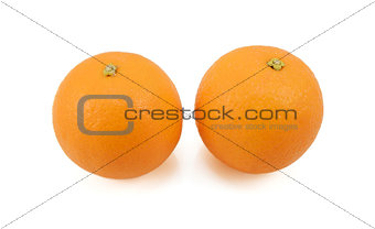Two whole ripe oranges