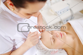 Ultrasonic face cleaning at the beauty spa