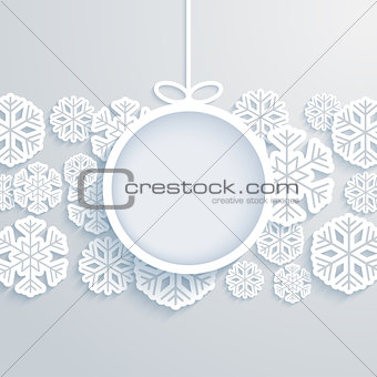 Christmas paper card with hanging toy and snowflakes.