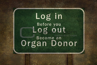 "Log in before you log out become an organ donor" roadside sign