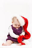 Child girl with Christmas santa hat
