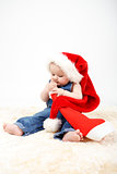 Child girl with Christmas santa hat