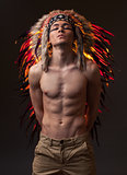 Indian strong man with traditional native american make up