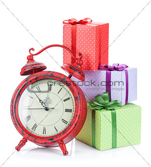 Christmas clock and three gift boxes