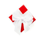 Red gift box with white ribbon