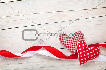 Valentines day background with hearts and ribbons