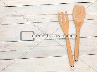 Kitchen utensil over wooden table