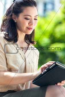Asian Chinese Woman With Tablet Computer