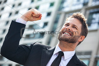 Young Successful Business Man Celebrating in City