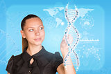Beautiful businesswoman in dress smiling and presses finger on model of DNA