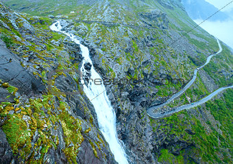 Summer waterfall on mountain slope (Norway).