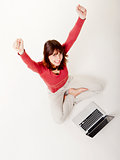 Happy woman with a laptop