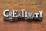 creativity word in metal type