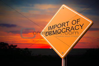 Import of Democracy on Warning Road Sign.